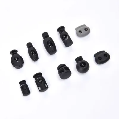 Spring-Loaded Plastic Cord Toggle Stopper